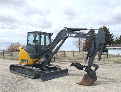 what kind of quick attach does john deere mini excavator|mini excavator tiller attachment.